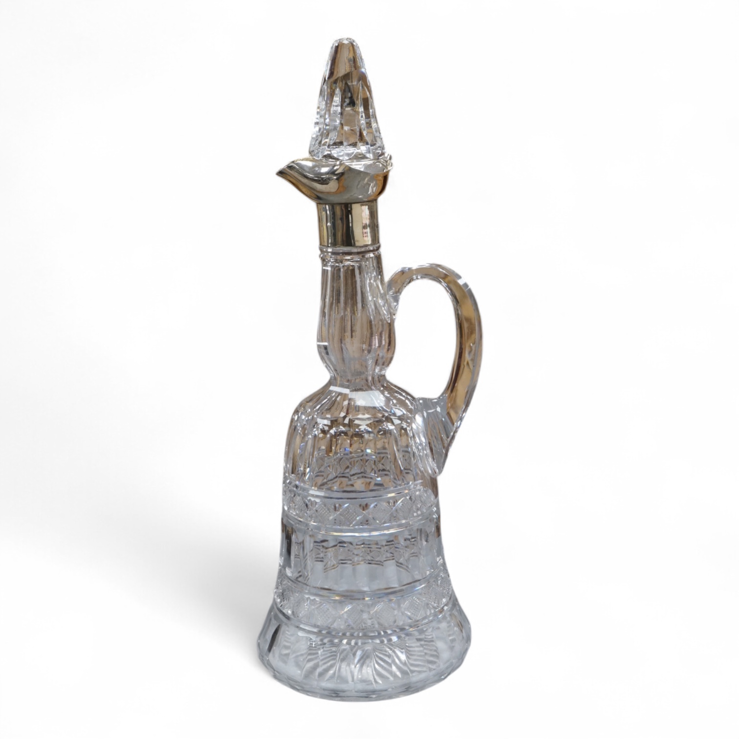 An Edwardian silver mounted cut glass bell shaped single handled decanter, with stopper, by Thomas Webb & Sons Ltd, London, 1902, 34.2cm.
